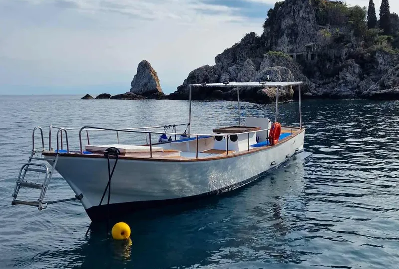 Iside boat off the Taormina coast