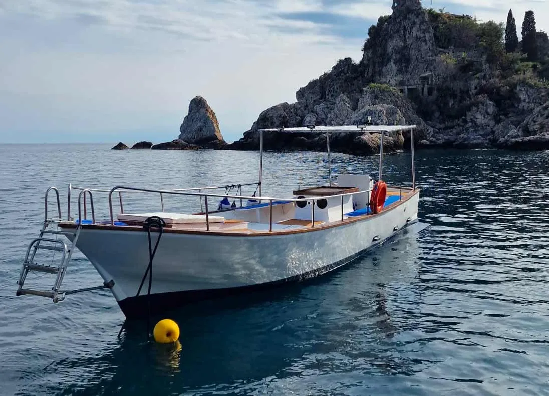 Iside boat off the Taormina coast