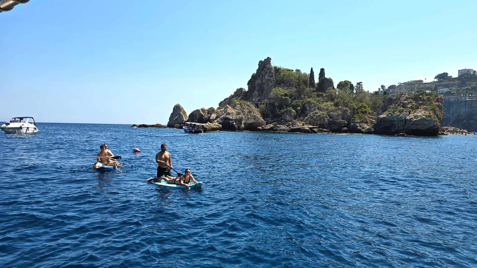 Group boat tour with aperitif in the bays of Taormina