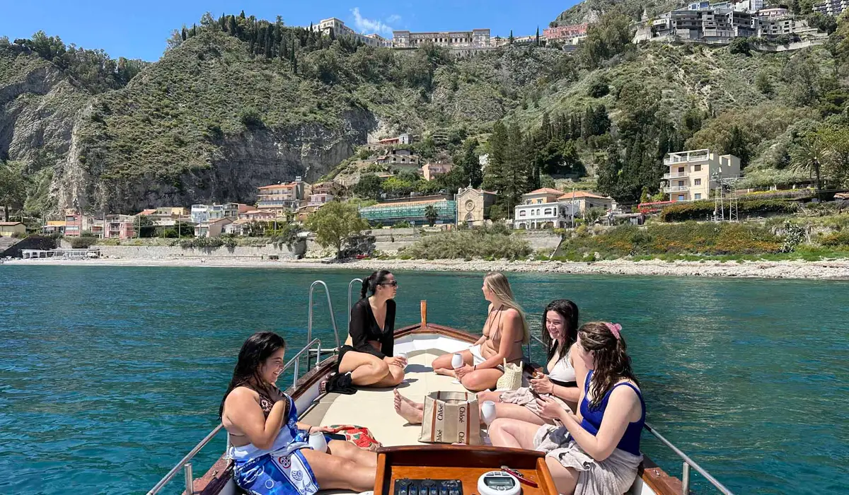 Panorama of Taormina from the private boat at sea