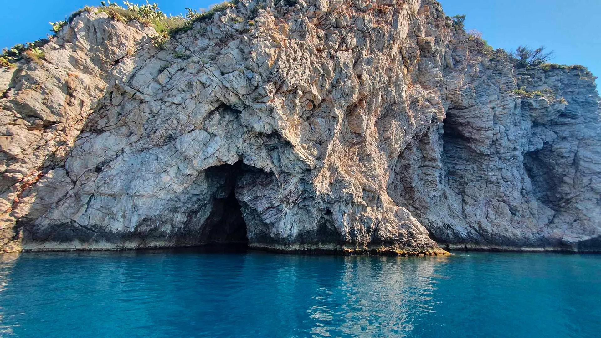 Half-day snorkeling boat tour in the clear waters of Taormina