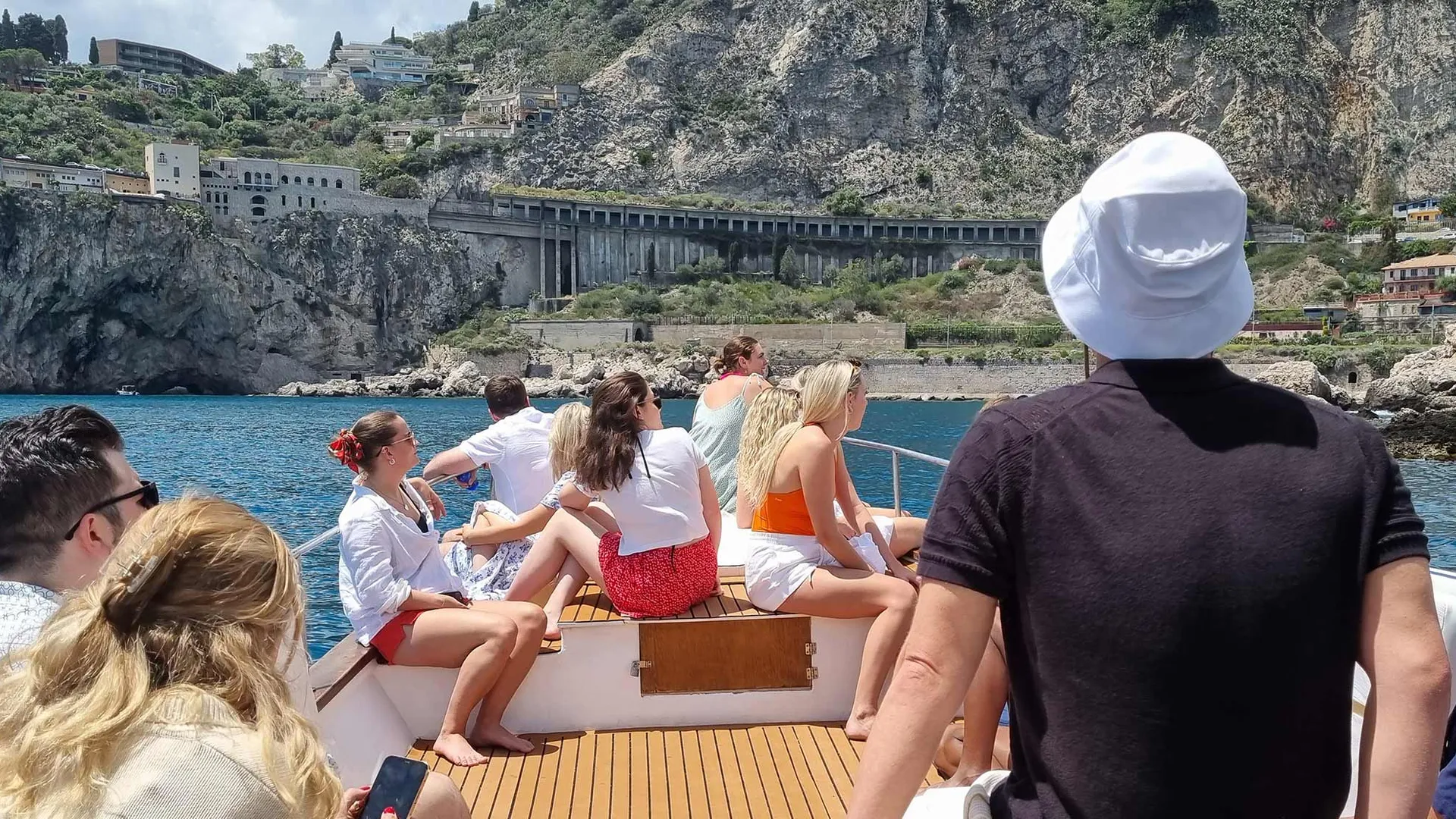 Wine tasting and Sicilian specialities aboard a Taormina boat tour