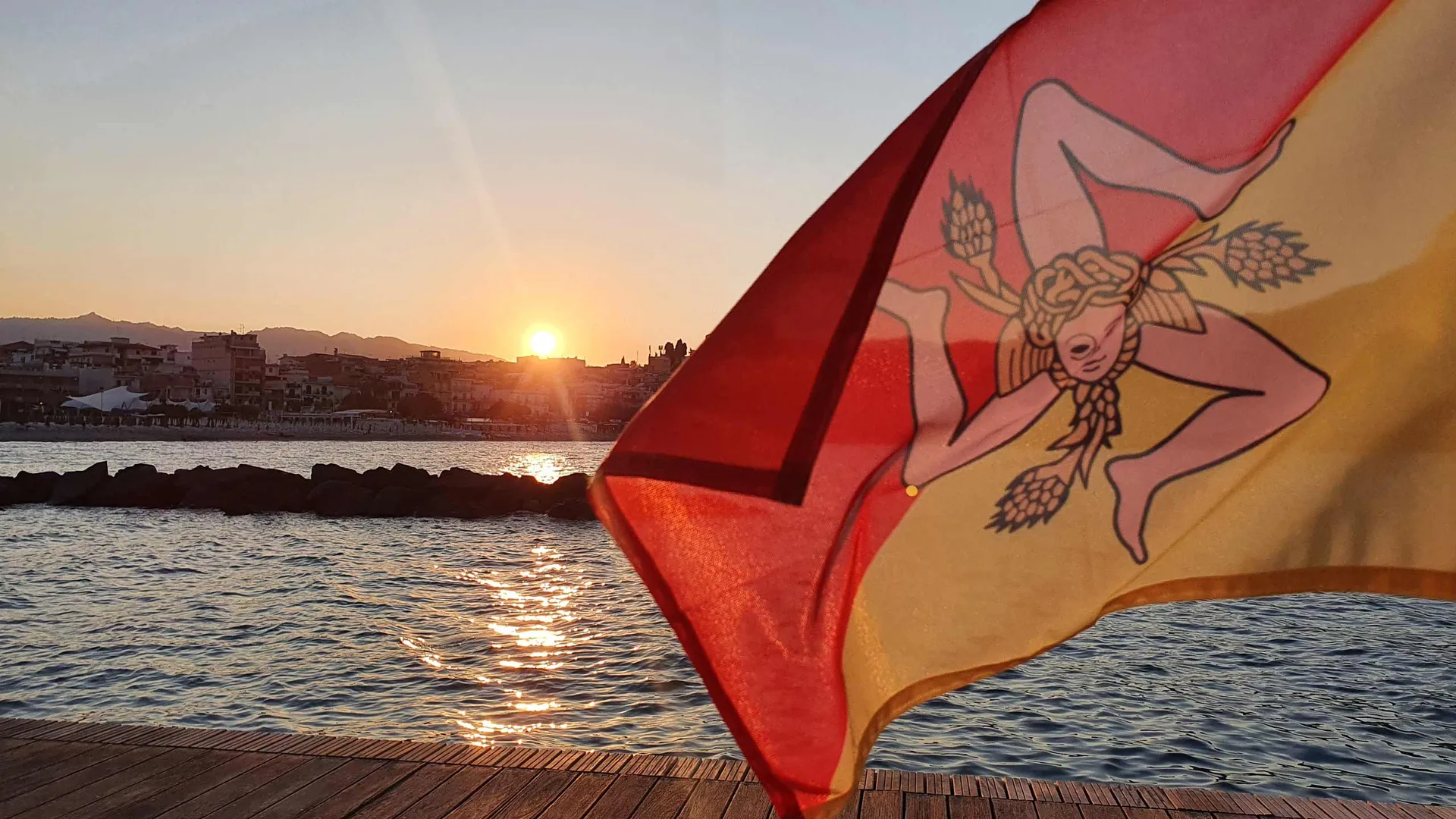 Sunset group boat tour along the Taormina coast